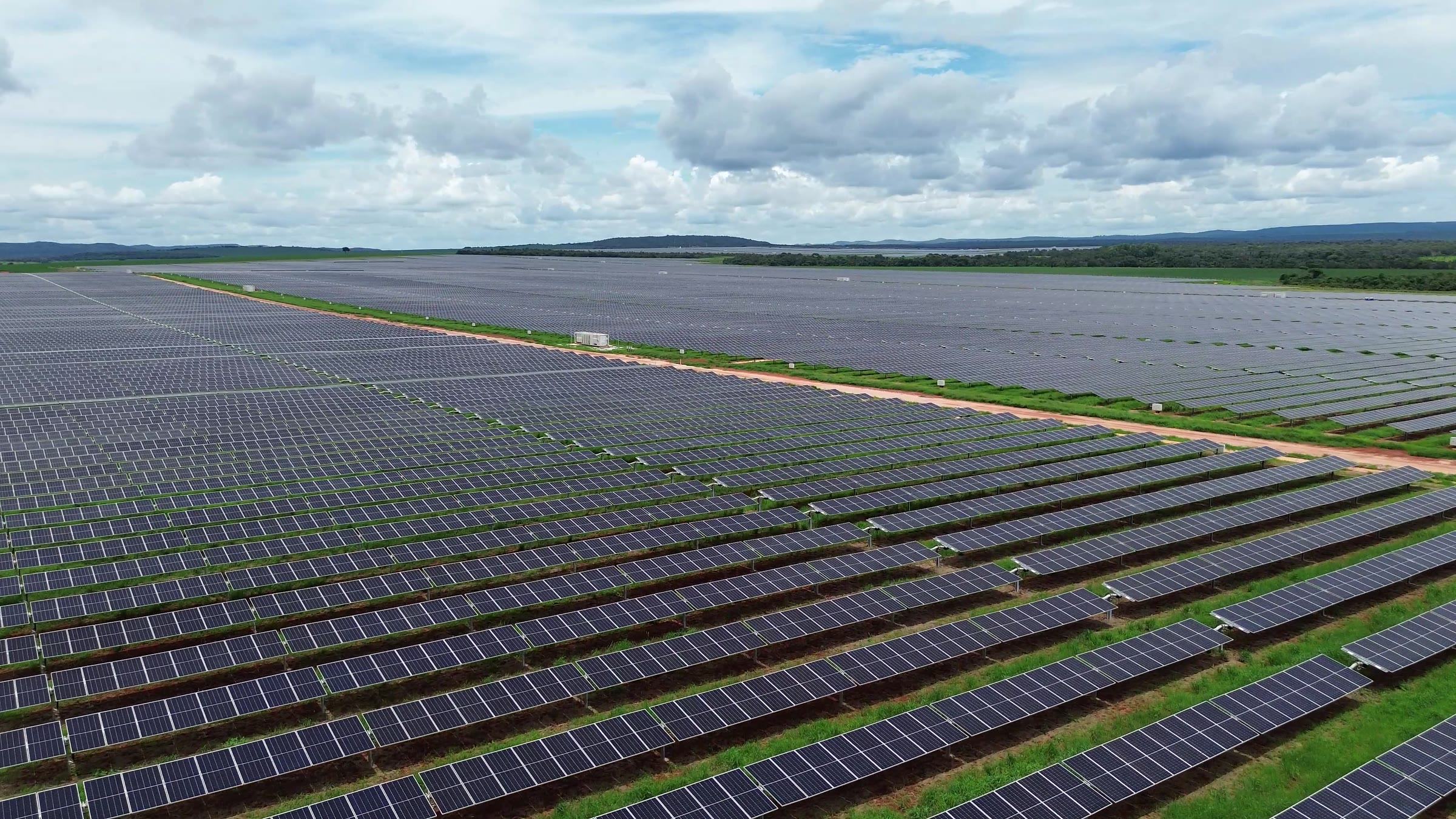 Large-scale solar plant under a cloudy sky